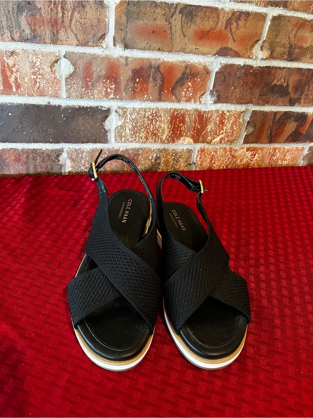 Cole Haan Women's Mikaela Stitchlite Sandal Flat, Sesame Knit, Black Size:6.5B